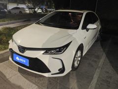 Toyota Corolla Dual-Engine 1.8L E-CVT Elite Edition - ფოტო 1