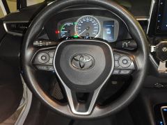 Toyota Corolla Dual-Engine 1.8L E-CVT Elite Edition - ფოტო 18