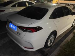 Toyota Corolla Dual-Engine 1.8L E-CVT Elite Edition - ფოტო 2