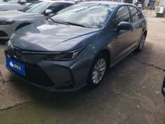 Toyota Corolla Dual-Engine 1.8L E-CVT Elite Edition - ფოტო 1