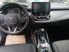 Toyota Corolla Dual-Engine 1.8L E-CVT Elite Edition - ფოტო 16