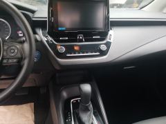 Toyota Corolla Dual-Engine 1.8L E-CVT Elite Edition - ფოტო 17