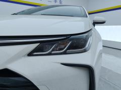 Toyota Corolla Dual-Engine 1.8L E-CVT Elite Edition - фото 4