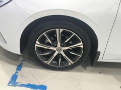 Geely Emgrand Passage 4 1.5L CVT Flagship - ფოტო 6