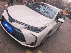 Toyota Corolla Dual-Engine 1.8L E-CVT Elite Edition - ფოტო 1