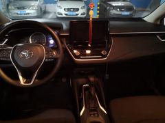 Toyota Corolla Dual-Engine 1.8L E-CVT Pioneer Edition - ფოტო 16
