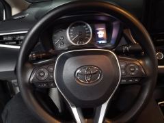 Toyota Corolla Dual-Engine 1.8L E-CVT Pioneer Edition - ფოტო 18