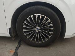 Denza D9 DM-i 970 4WD Flagship Edition - ფოტო 6