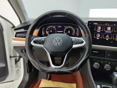 Volkswagen Bora 200TSI PRO Edition - ფოტო 18