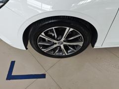 Geely Emgrand Passage 4 1.5L CVT Flagship - ფოტო 6