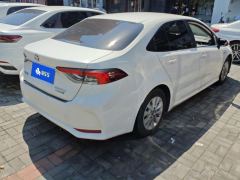 Toyota Corolla Dual-Engine 1.8L Pioneer Edition - фото 2