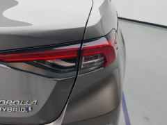 Toyota Corolla Dual-Engine 1.8L E-CVT Elite Edition - фото 5