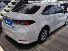 Toyota Corolla Dual-Engine 1.8L E-CVT Pioneer Edition - ფოტო 2