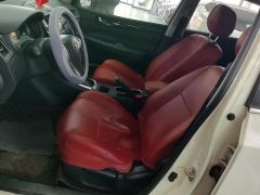 Nissan Tiida Kanda 1.6L CVT Smart Edition - ფოტო 14