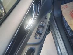 Nissan Tiida 1.6L Edition - ფოტო 13