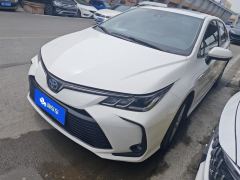 Toyota Corolla Dual-Engine 1.8L E-CVT Elite Edition - ფოტო 1