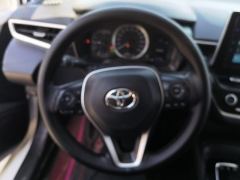 Toyota Corolla Dual-Engine 1.8L E-CVT Elite Edition - ფოტო 18