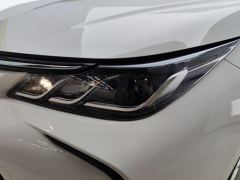 Toyota Corolla Dual-Engine 1.8L E-CVT Elite Edition - ფოტო 4