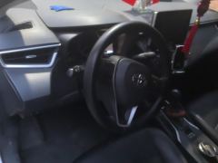 Toyota Corolla Dual-Engine 1.8L E-CVT Elite Edition - ფოტო 16