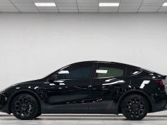 Tesla Model Y Rear-Wheel Drive - ფოტო 3