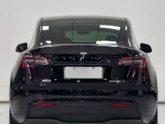 Tesla Model Y Rear-Wheel Drive - ფოტო 4