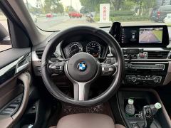BMW X1 sDrive25Li Premier - ფოტო 14