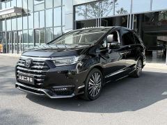 Honda Odyssey 2.0L e:HEV Luxury - ფოტო 1