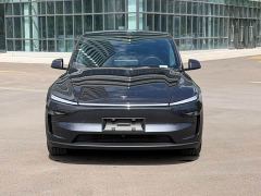 Tesla Model Y Rear-Wheel Drive - ფოტო 1