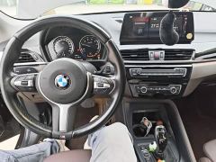 BMW X1 sDrive25Li Premier - ფოტო 9