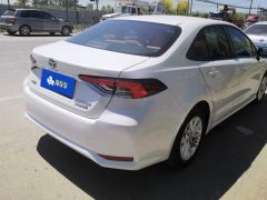 Toyota Corolla Dual-Engine 1.8L E-CVT Elite Edition - ფოტო 2