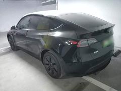 Tesla Model Y Rear-Wheel Drive - ფოტო 4