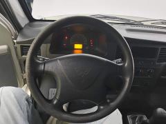 Wuling Zhiguang 1.5L Practical 5/7-seater - ფოტო 10