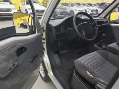 Wuling Zhiguang 1.5L Practical 5/7-seater - ფოტო 14
