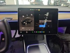 Tesla Model Y Rear-Wheel Drive - ფოტო 12