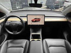 Tesla Model Y Rear-Wheel Drive - ფოტო 11