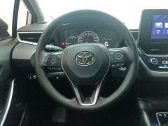 Toyota Corolla Dual-Engine 1.8L E-CVT Pioneer Edition - ფოტო 18