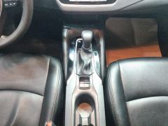 Toyota Corolla Dual-Engine 1.8L E-CVT Pioneer Edition - ფოტო 19