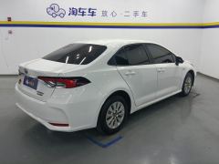 Toyota Corolla Dual-Engine 1.8L E-CVT Pioneer Edition - ფოტო 2