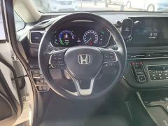Honda Odyssey 2.0L e:HEV Sharp Premium Edition - ფოტო 10