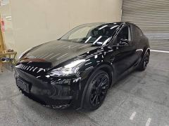 Tesla Model Y Standard Range RWD - ფოტო 1