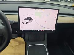 Tesla Model Y Standard Range RWD - ფოტო 12