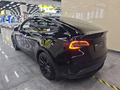 Tesla Model Y Standard Range RWD - ფოტო 4