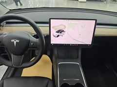 Tesla Model Y Standard Range RWD - ფოტო 9