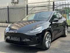 Tesla Model Y Rear-Wheel Drive - ფოტო 1