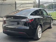 Tesla Model Y Rear-Wheel Drive - ფოტო 14
