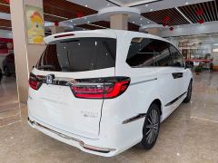 Honda Odyssey 2.0L e:HEV Luxury - ფოტო 4