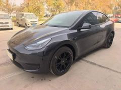 Tesla Model Y Rear-Wheel Drive - ფოტო 1