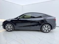 Tesla Model Y Standard Range RWD - ფოტო 3