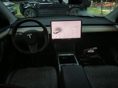 Tesla Model Y Standard Range RWD - ფოტო 9