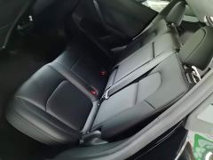 Tesla Model Y Rear-Wheel Drive - ფოტო 16